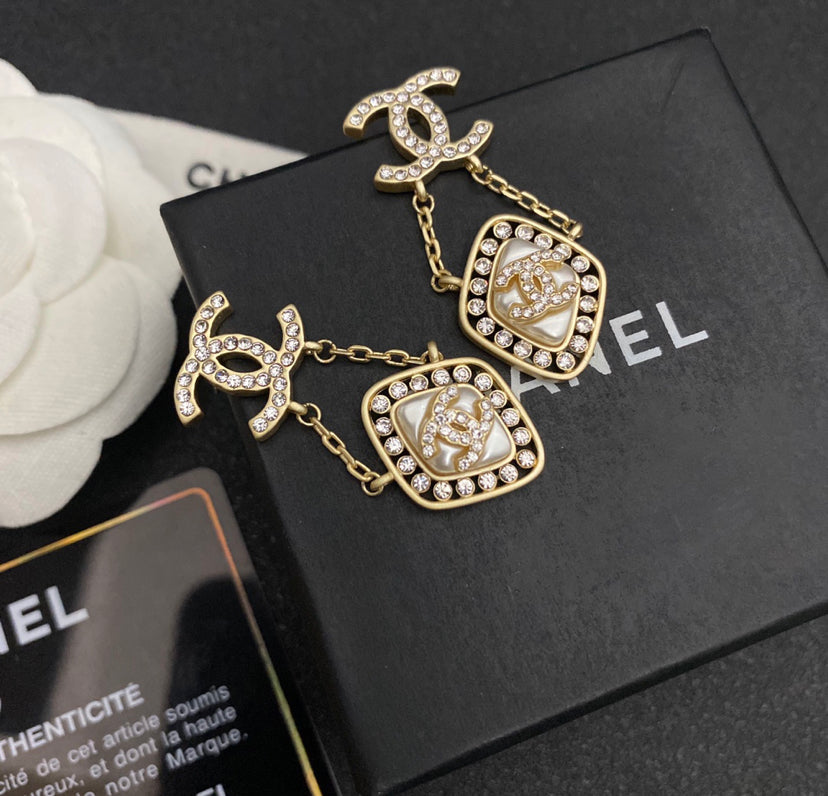 CC woman earrings